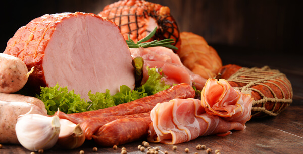 Assorted meat products including ham and sausages. Deli Ham and Sausage.jpg